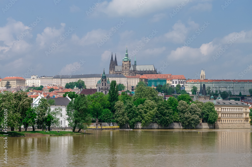 View of colorful old town, Prague castle and St. Vitus Cathedral with river Vltava, Czech Republic