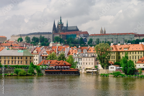 View of colorful old town, Prague castle and St. Vitus Cathedral with river Vltava, Czech Republic