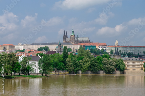 View of colorful old town, Prague castle and St. Vitus Cathedral with river Vltava, Czech Republic © smoke666