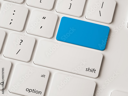 Modern white keyboard with blank blue button.