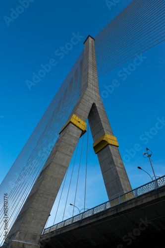 Fototapeta Naklejka Na Ścianę i Meble -  The bridge construction on twilight and river reflection at nigh