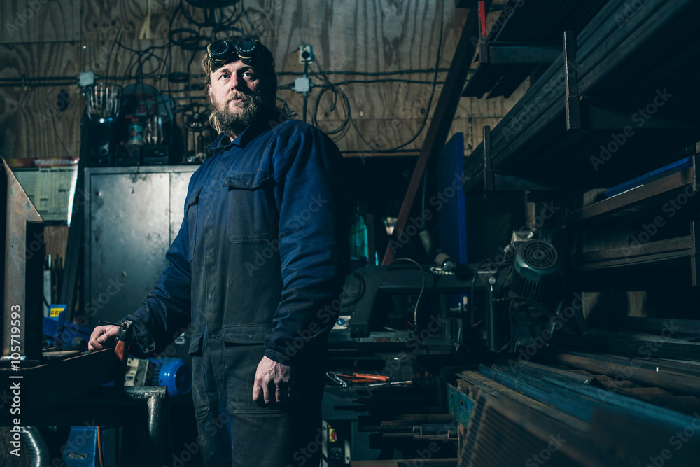 Welder standing in workplace Welder standing in workplace