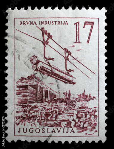 Stamp printed in Yugoslavia shows lumber industry, circa 1958