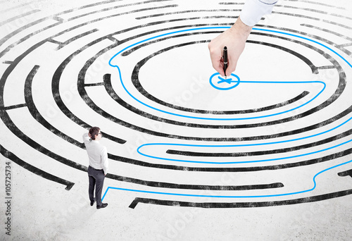 Fotografija Businessman in front of labyrinth