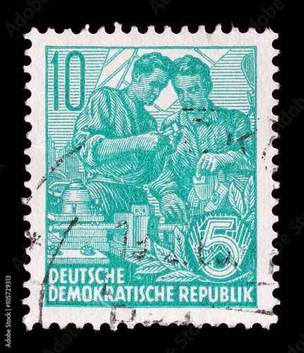 Stamp printed in GDR  shows Two workers  series Five year plan  circa 1953