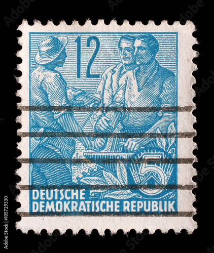 Stamp printed in GDR, shows Farmer, worker, intellectuals, series Five-year plan, circa 1955