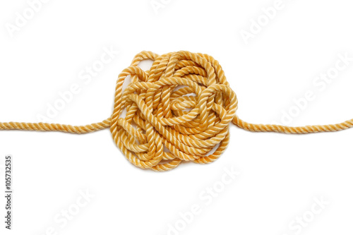 Ball of hemp rope isolated on white background. Industrial background.