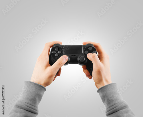 Hand hold new joystick isolated. Gamer play game with gamepad.