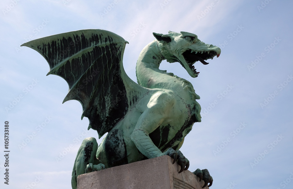 Dragon - symbol of the Slovenian capital on the Dragon Bridge in Ljubljana, Slovenia