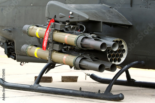 Canvas Print Wire-guide anti-tank missile and rocket launcher mounted on attack helicopter