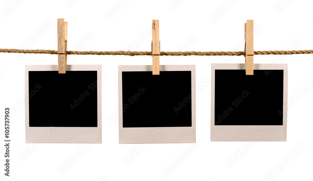 Fotka „Several three blank polaroid style instant photo print frame row  hanging on string rope or washing line isolated on white background“ ze  služby Stock | Adobe Stock