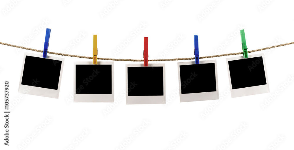 Several blank polaroid style instant photo print frames hanging on Several blank polaroid style instant photo print frames hanging on