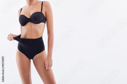 Pretty young healthy girl with thin waist