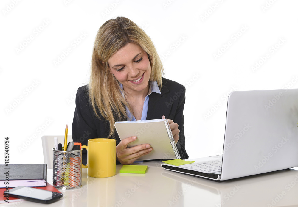 corporate portrait young happy Caucasian blond business woman working using digital tablet pad at office corporate portrait young happy Caucasian blond business woman working using digital tablet pad at office
