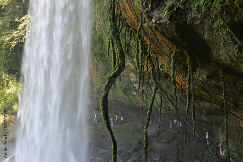 Fototapeta Naklejka Na Ścianę i Meble -  Misol-Ha waterfall with people in background, Chiapas, Mexico,