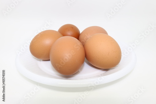 Hen eggs on white background.