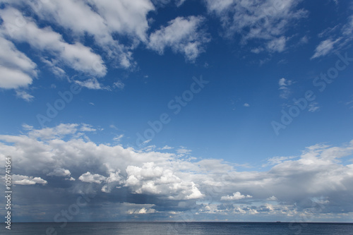 exotic tropical beach, golden sand and beautiful clouds