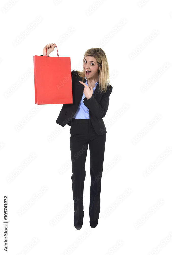 young happy beautiful woman in business suit in excited face expression holding red shopping bag young happy beautiful woman in business suit in excited face expression holding red shopping bag
