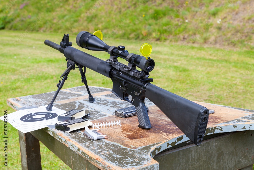weapon and target sign on a table weapon and target sign on a table