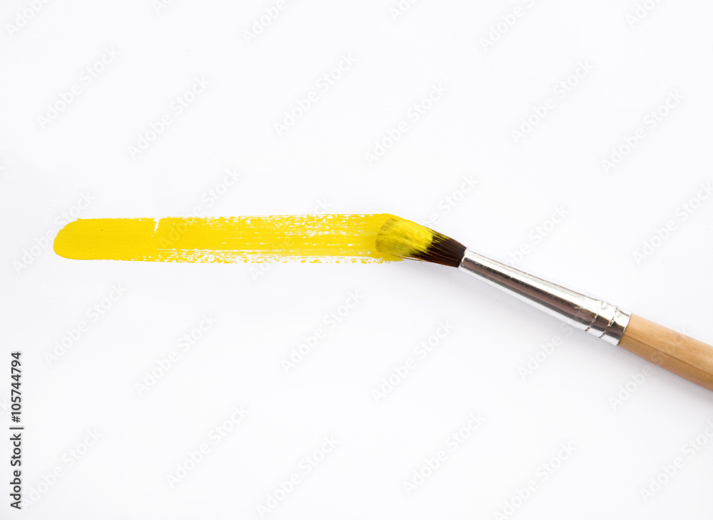 Fototapeta premium artist yellow brush and paint scratch