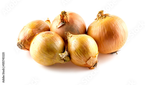 Group of bright orange onions on white