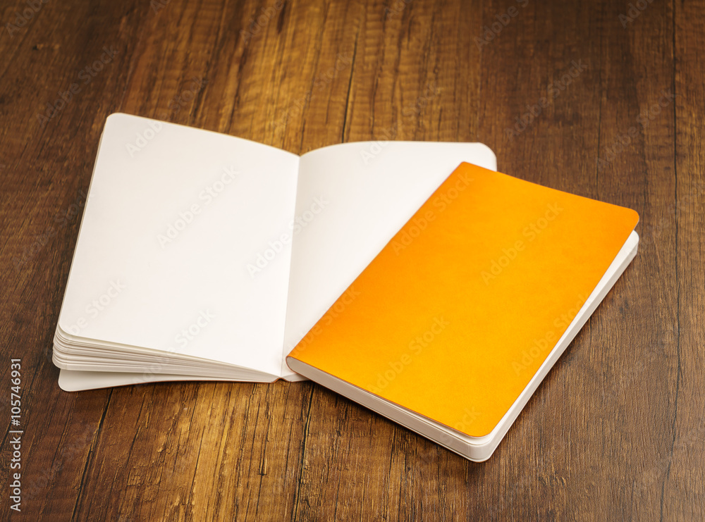 Blank catalog, magazines,book mock up on wood background Blank catalog, magazines,book mock up on wood background