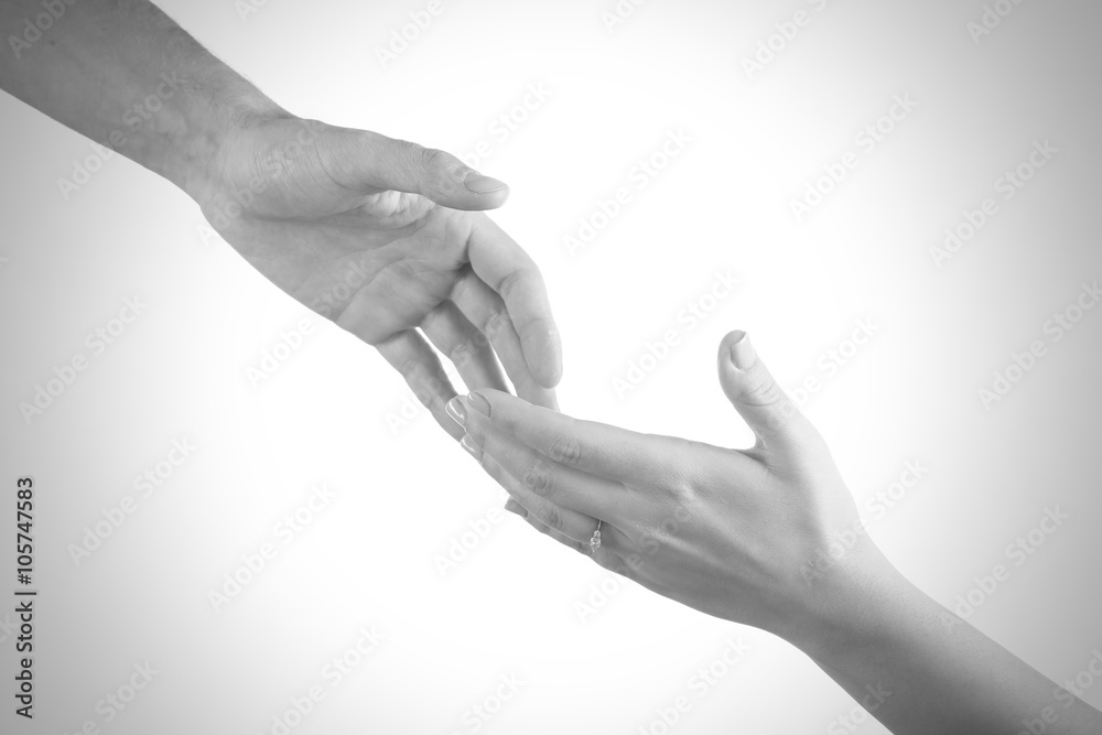 Two hands reaching toward each other. Helping concept. Vintage tone Two hands reaching toward each other. Helping concept. Vintage tone