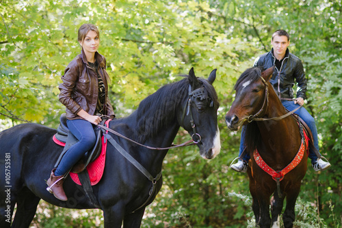 couple in love, horseback riding, summer forest