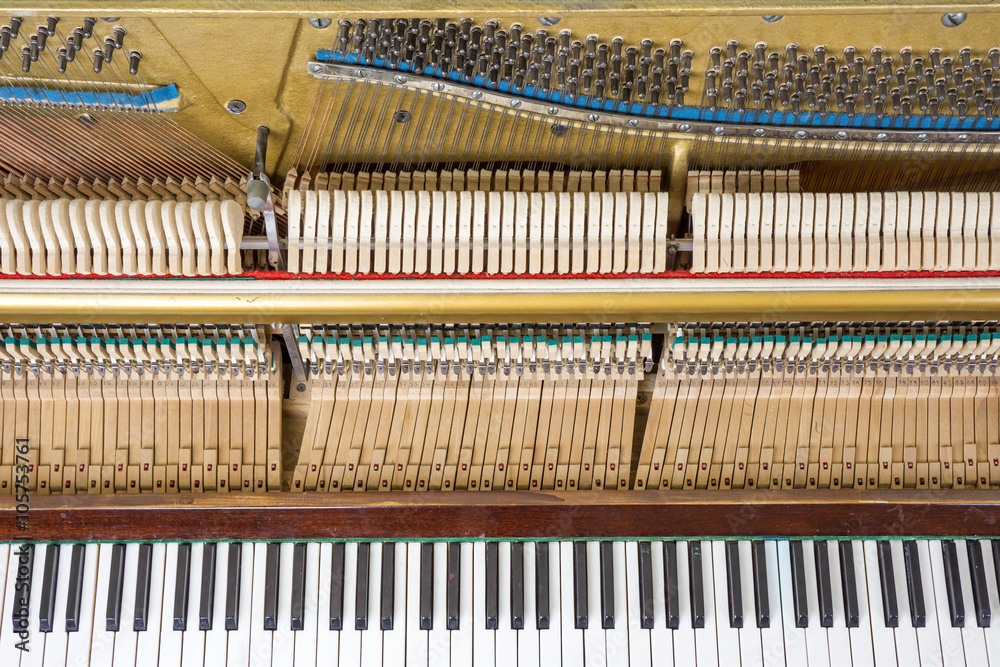 Keyboard and mechanics of an upright piano Keyboard and mechanics of an upright piano