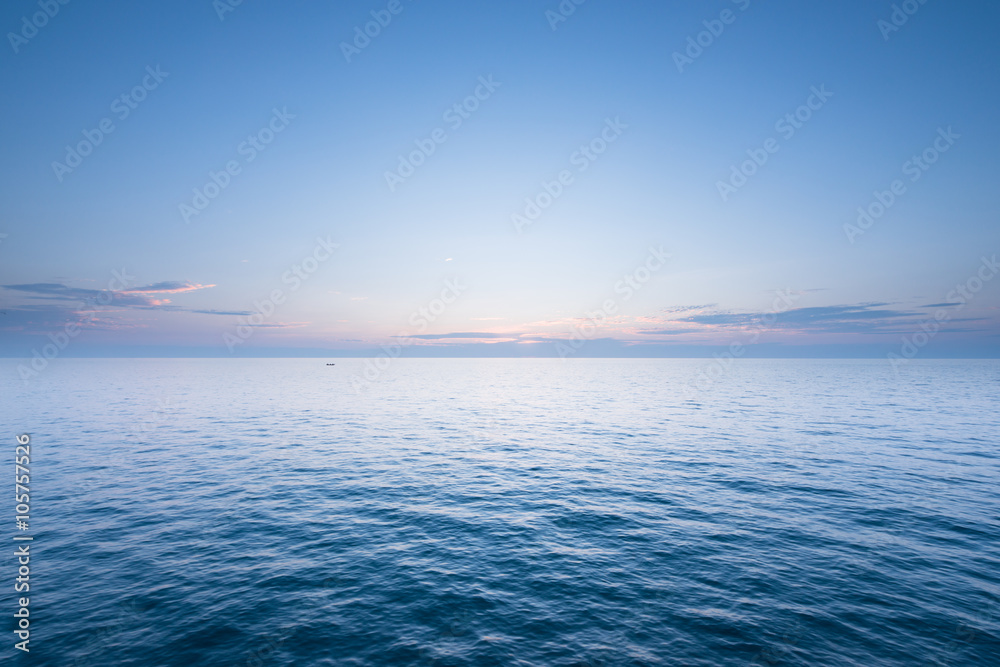 Beautiful sunset with blue sea and sky peaceful background long Beautiful sunset with blue sea and sky peaceful background long