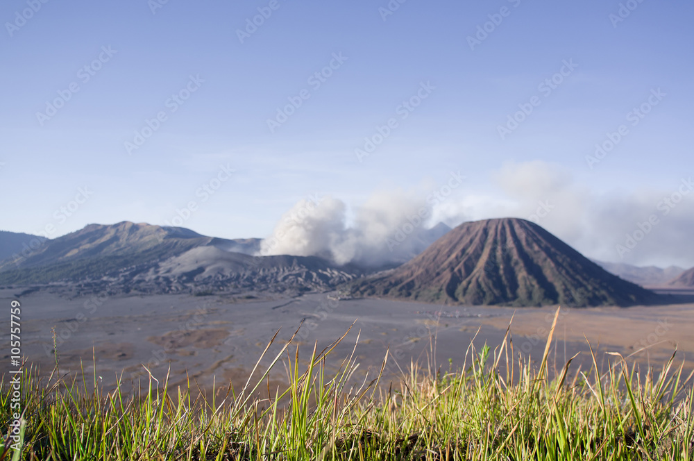 Fototapeta premium Eruption of mount Bromo in sunrise light in Bromo Tengger Semeru National Park, East Java, Indonesia
