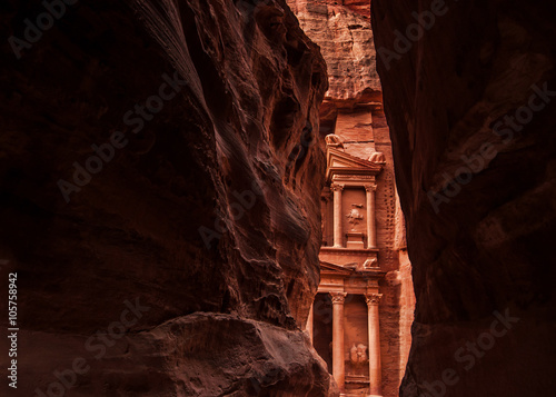 Narrow slot-canyon that serves as the entrance passage to the hidden city of Petra, Jordan. UNESCO World Heritage Site