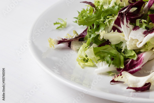 chopped lettuce on white plate