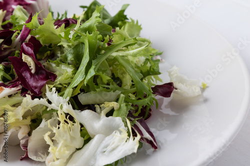 chopped lettuce on white plate