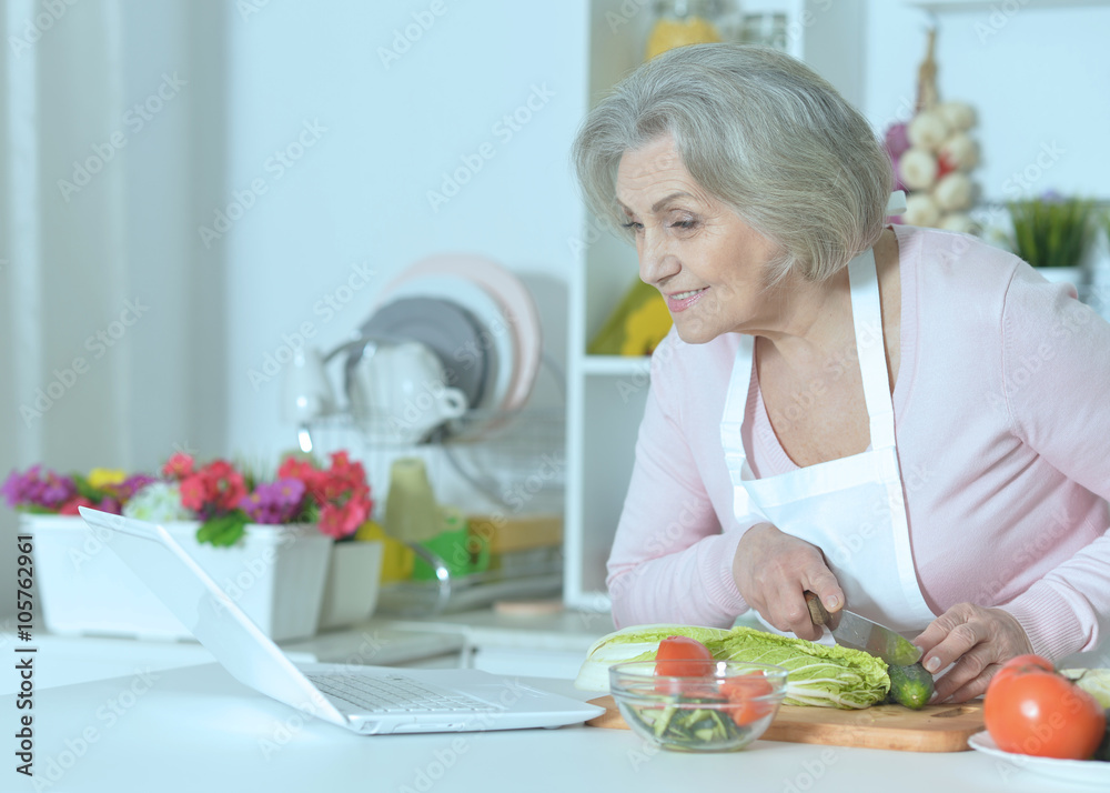 Senior woman cooking in kitchen