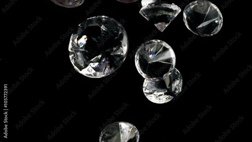 Extra Large Glass Diamonds Falling Over Black Slow Motion Extra Large Glass Diamonds Falling Over Black Slow Motion