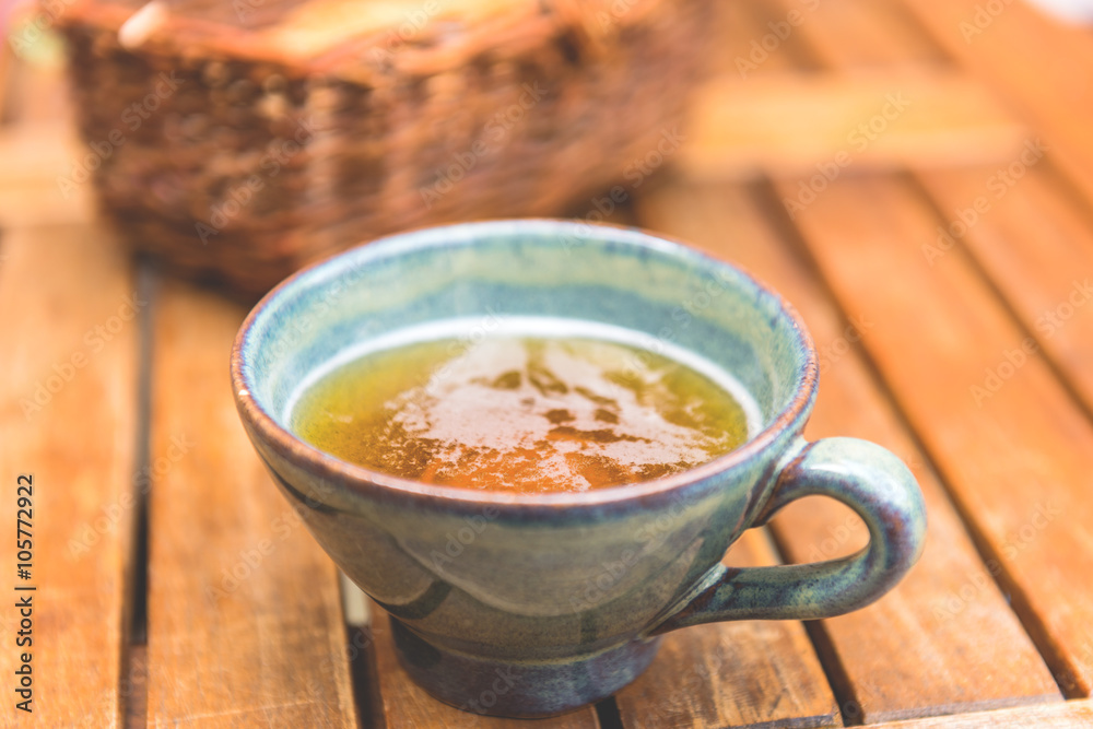 Norman apple cider in a typical ceramic cup