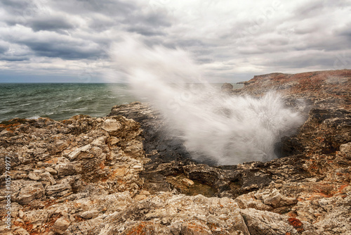 Dramatic seascape with rocks and waves