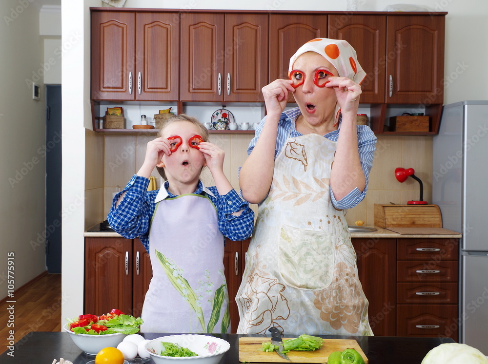 little girl is having fun with her mother at kitchen little girl is having fun with her mother at kitchen