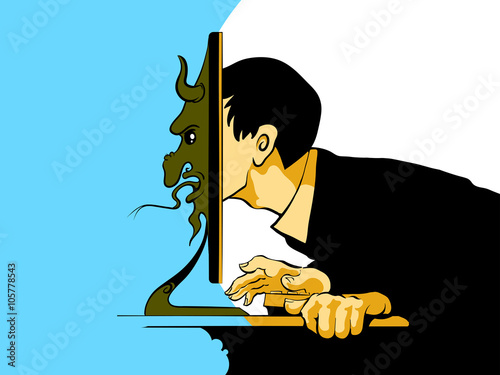 Internet troll sitting at the computer photo
