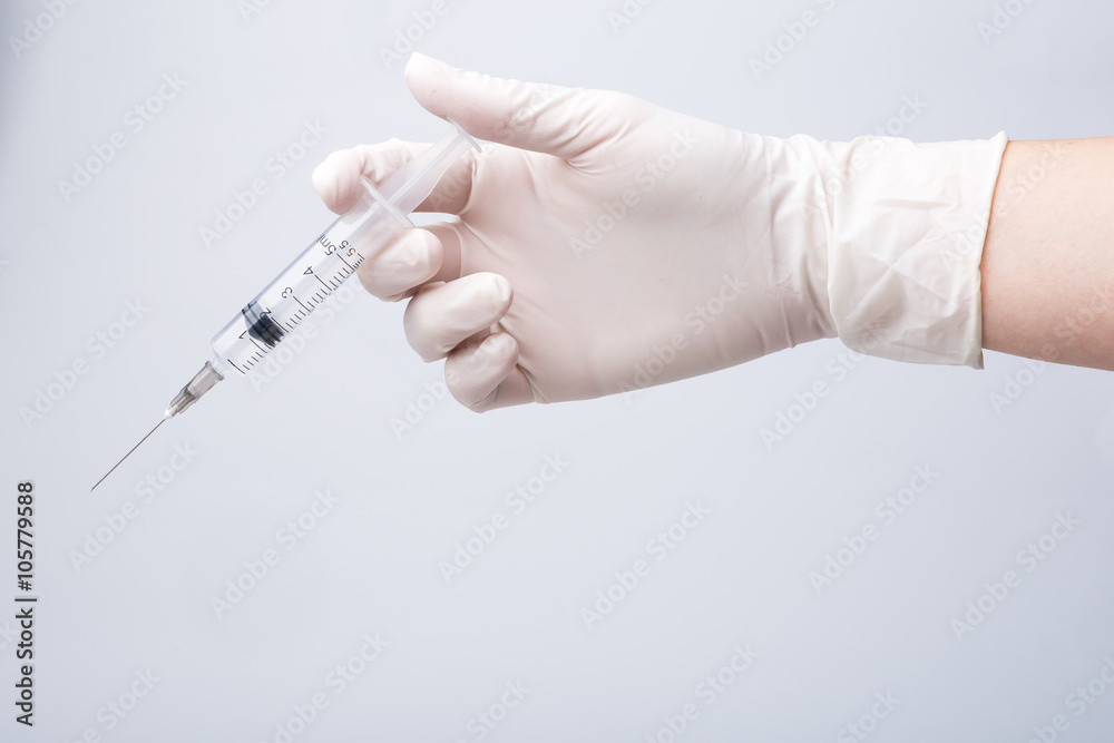 Doctor Hand Holding Syringe Size 5 ML of Vaccine.Concept Idea is