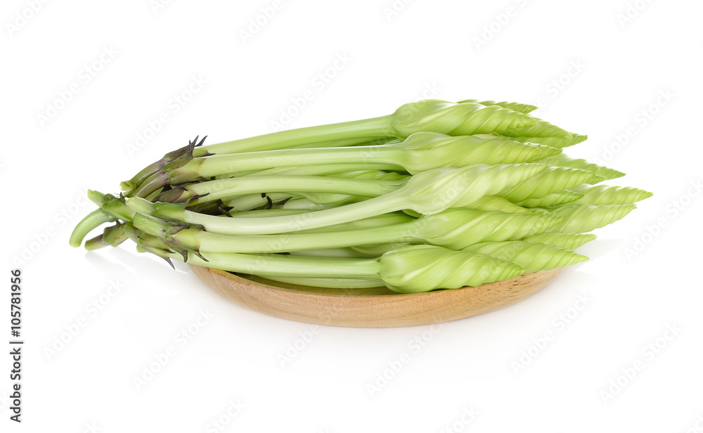 Moonflower (Ipomoea alba) in wood dish on white background Moonflower (Ipomoea alba) in wood dish on white background