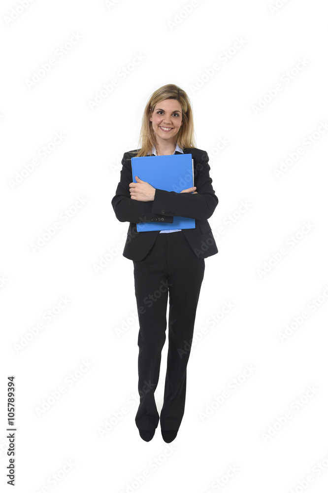corporate portrait young happy businesswoman holding folder posing confident smiling and relaxed corporate portrait young happy businesswoman holding folder posing confident smiling and relaxed