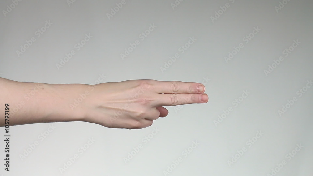 Woman hand showing number two or scissors gesture. Woman hand showing number two or scissors gesture.