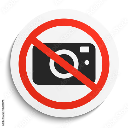 No Photos Sign on White Round Plate