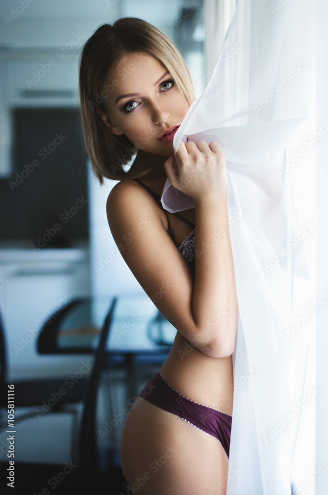 Beautiful blonde girl in a sexy lingerie Stock Photo Adobe Stock