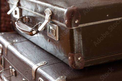 stack of vintage retro suitcases closeup