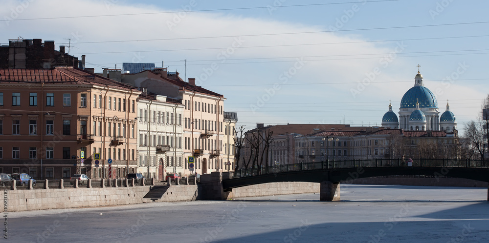 English bridge across the Fontanka river Trinity Cathedral Petersburg, Russia