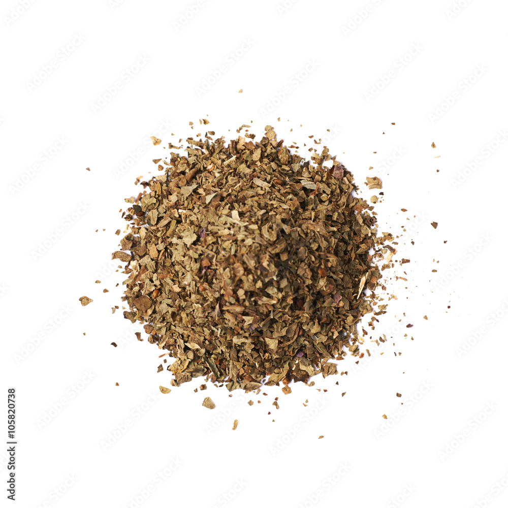 Pile of dried basil seasoning isolated Pile of dried basil seasoning isolated