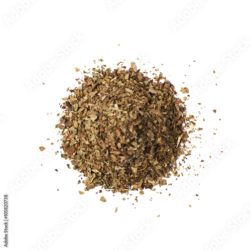 Pile of dried basil seasoning isolated
